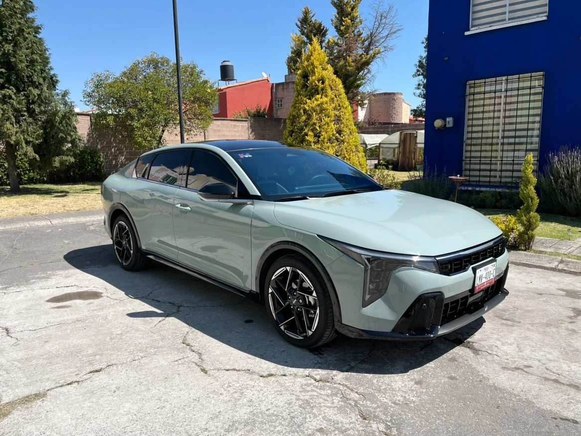 A customer’s clean silver sedan after detailing