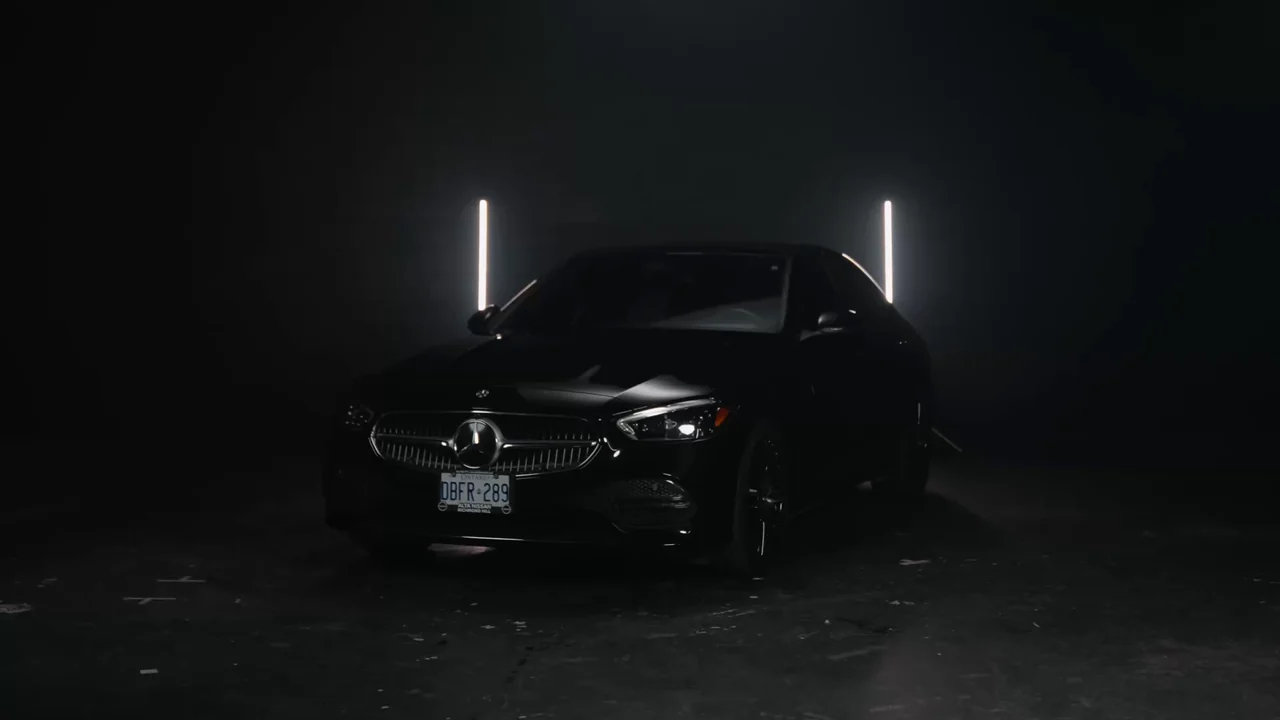A finished black Mercedes under studio lights in the Magic Shield brand film