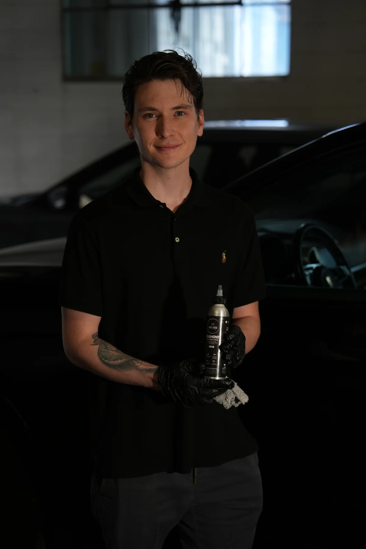 A car-care enthusiast in the garage with Magic Shield